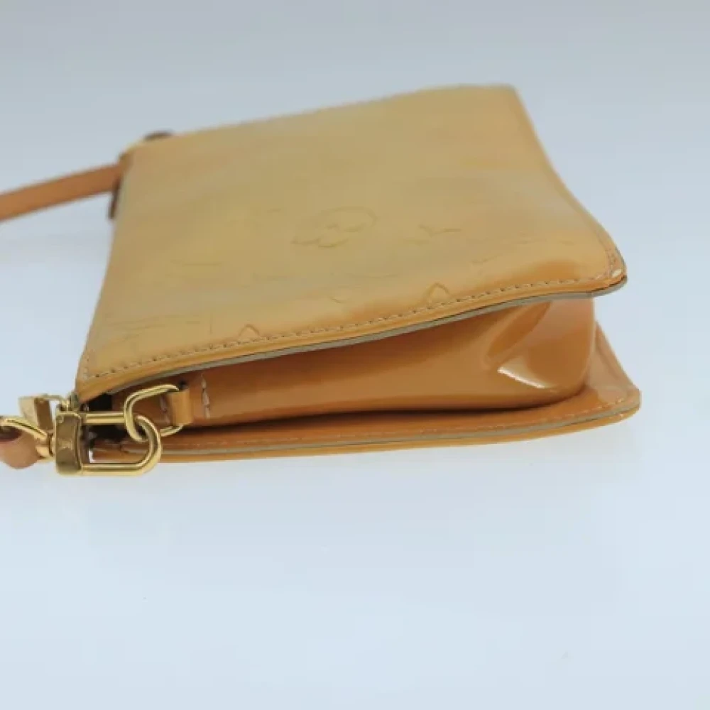 Louis Vuitton Vintage Pre-owned Leather pouches Beige Dames