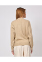 cardigan-beige-avec-details-scintillants