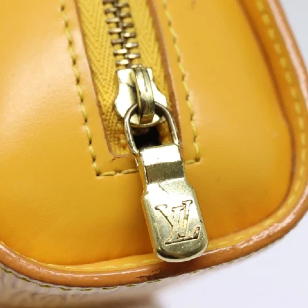 Louis Vuitton Vintage Pre-owned Leather pouches Yellow Dames