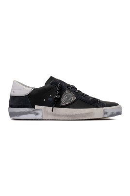 baskets-en-cuir-noir-et-blanc-use