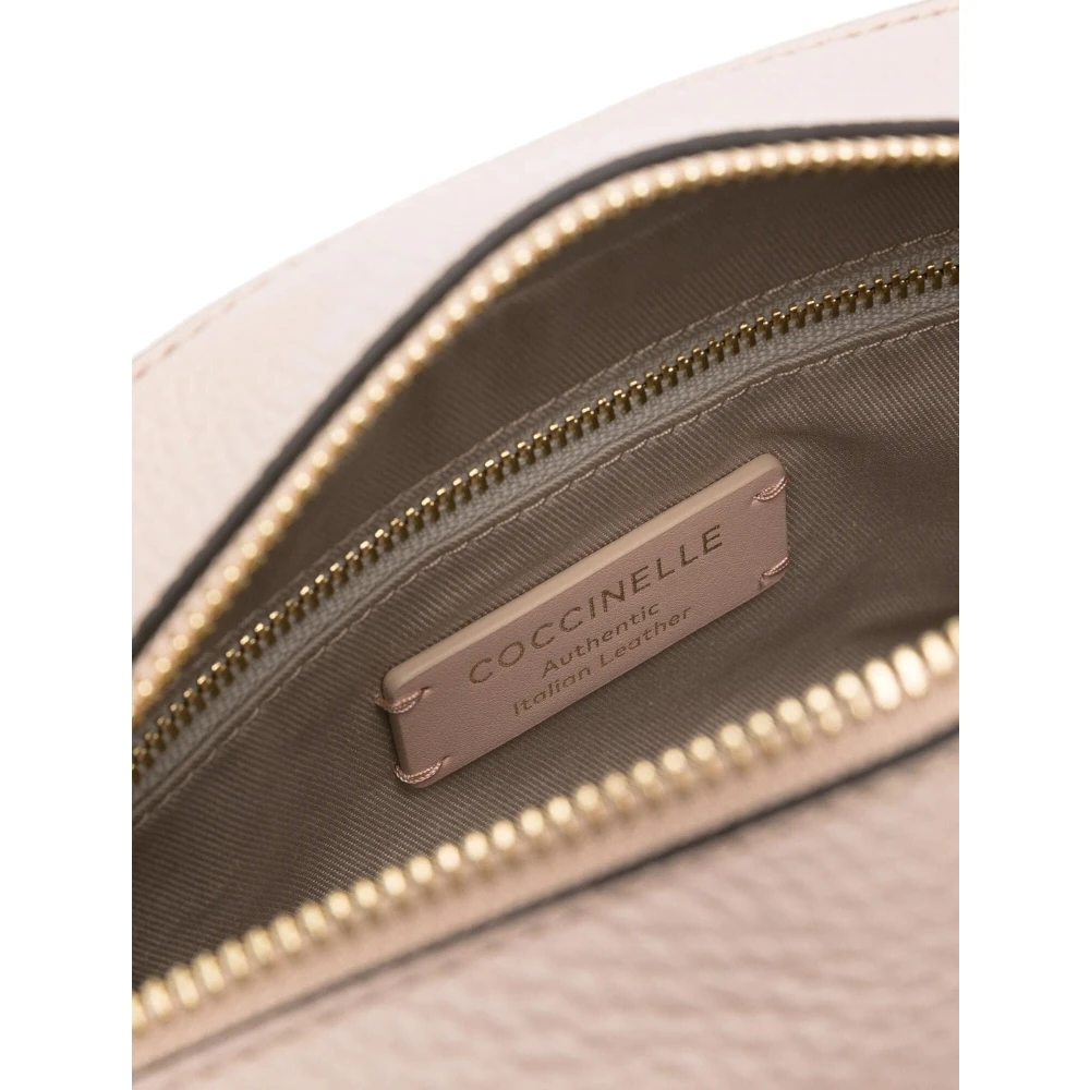 Coccinelle Gestanste leren crossbody tas met gegraveerde logogesp Pink Dames