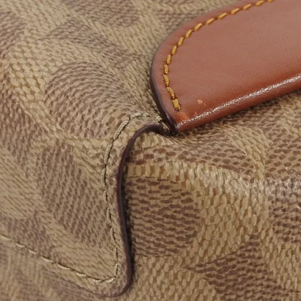 Coach Pre-owned Plastic handbags Brown Dames