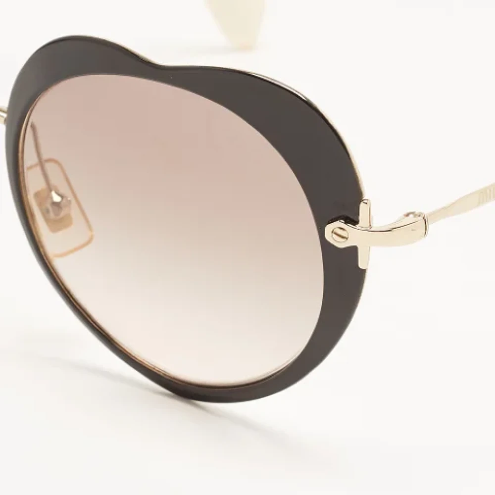 Miu Pre-owned Acetate sunglasses Brown Dames