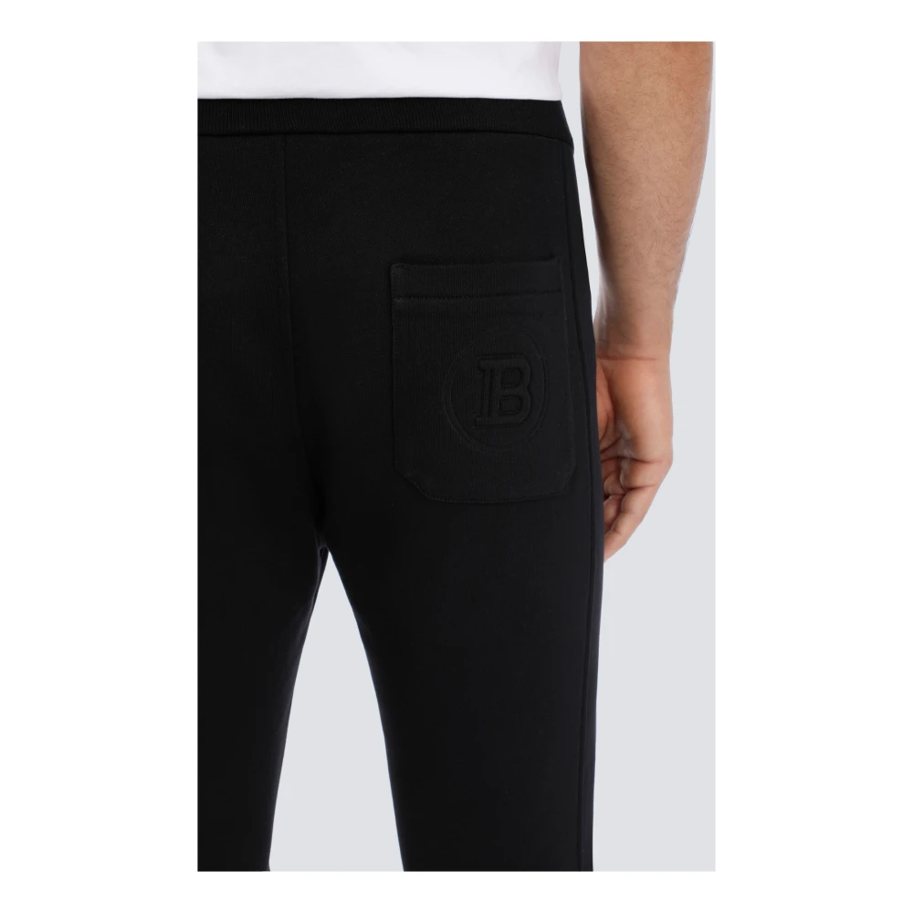 Balmain Zwarte katoenen sweatpants met reliëf Paris-logo. Black Heren