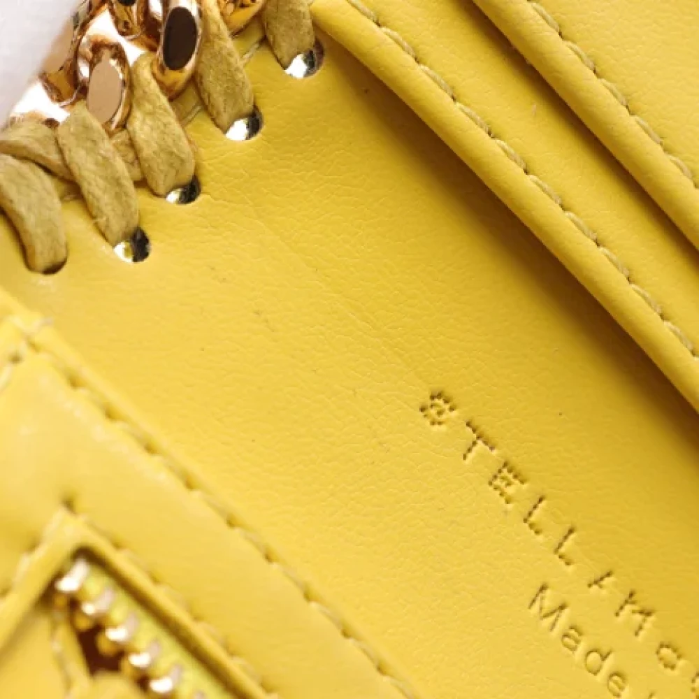 Stella McCartney Pre-owned Leather wallets Yellow Dames