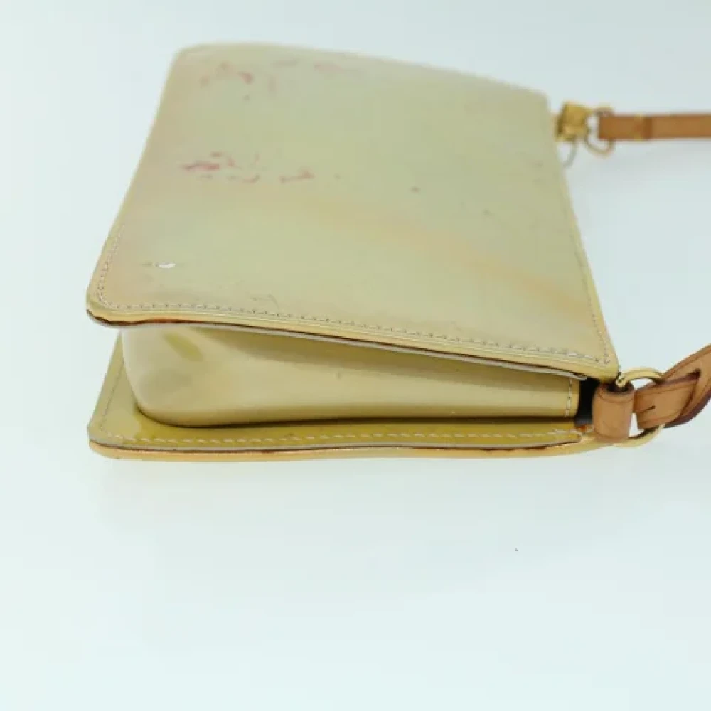 Louis Vuitton Vintage Pre-owned Leather clutches Beige Dames