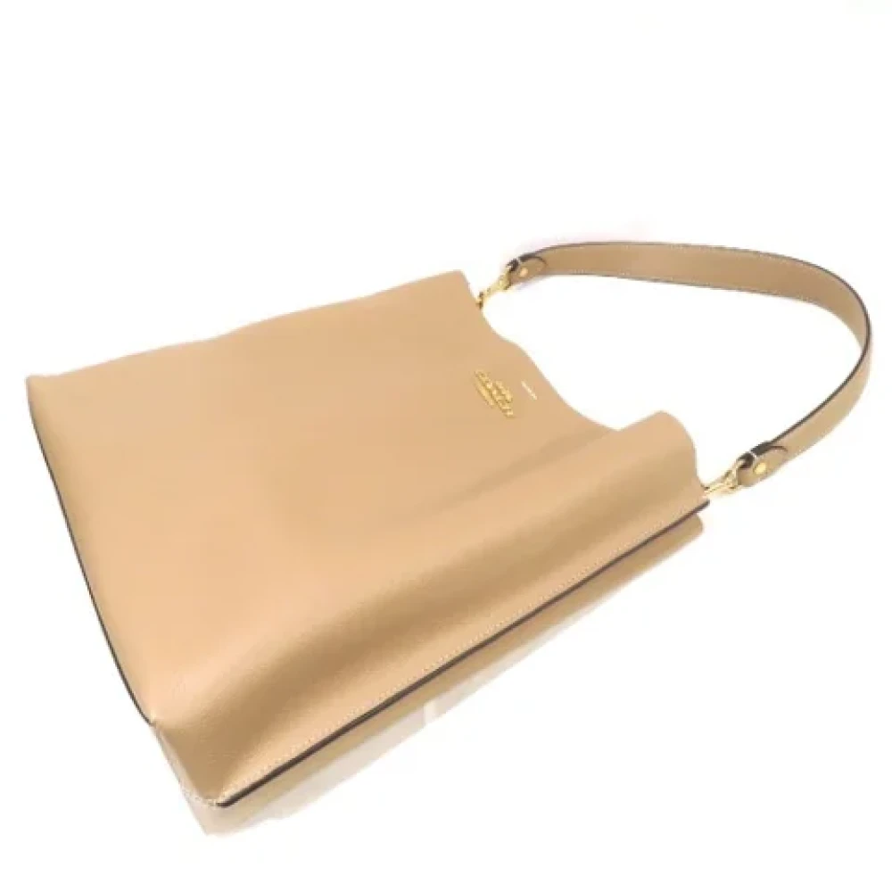 Coach Pre-owned Leather handbags Beige Dames