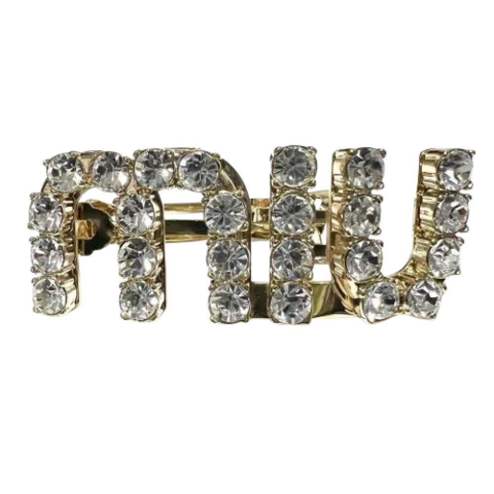 Miu Pre-owned Metal hair-accessories Yellow Dames