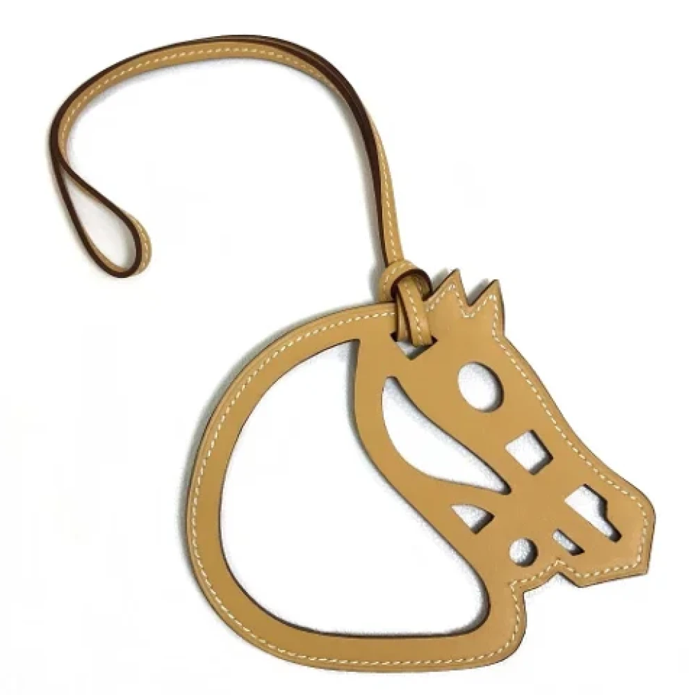 Hermès Vintage Pre-owned Leather key-holders Beige Unisex