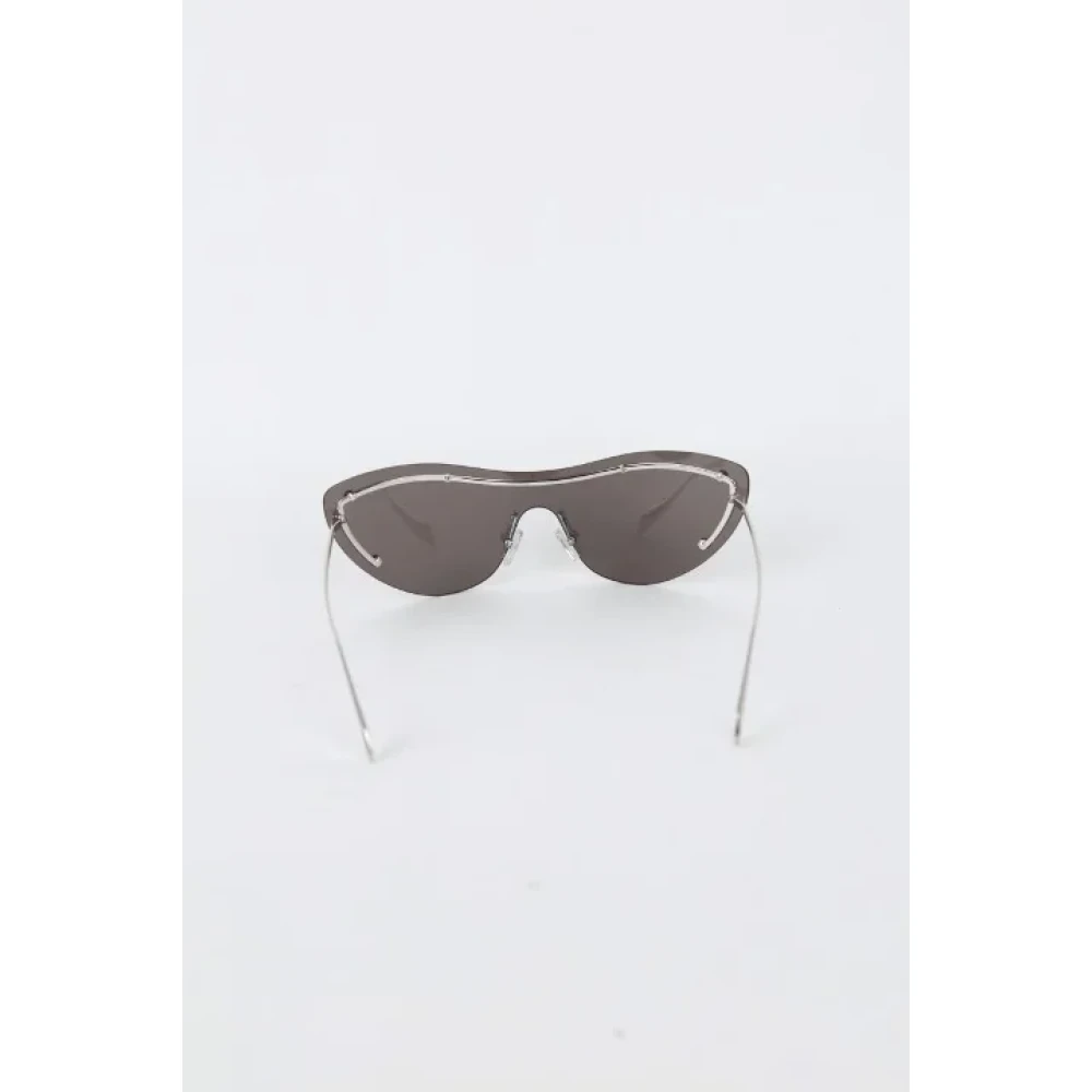 Alexander McQueen Pre-owned Metal sunglasses Black Dames