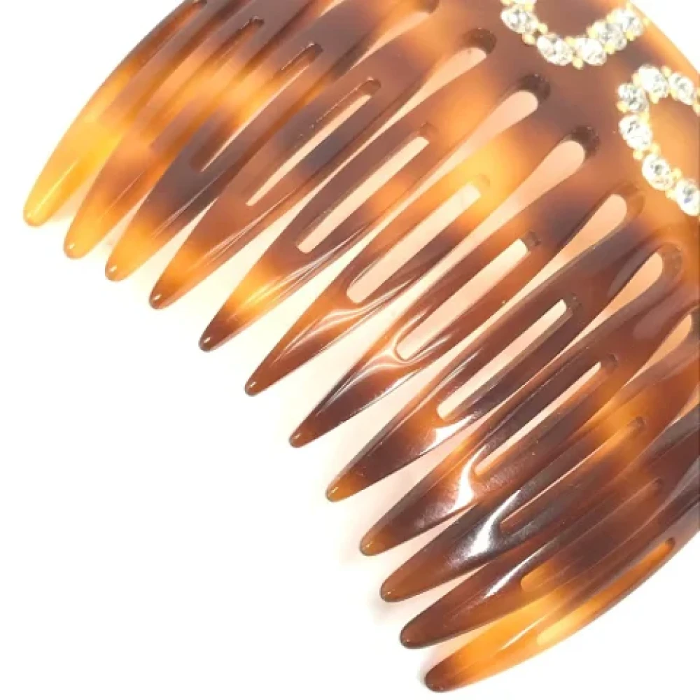 Gucci Vintage Pre-owned Plastic hair-accessories Brown Dames