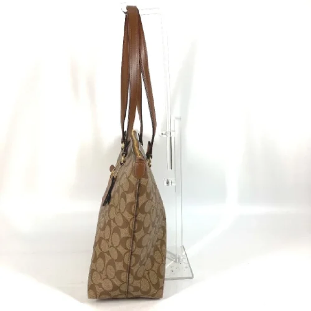 Coach Pre-owned Fabric handbags Brown Dames