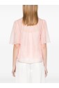 pink-shirt-with-keyhole-detailing
