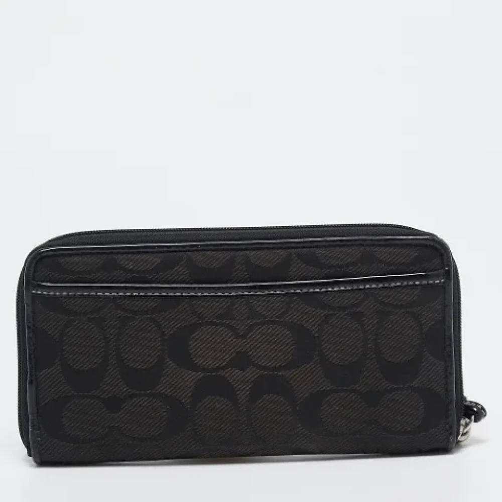 Coach Pre-owned Canvas clutches Black Dames