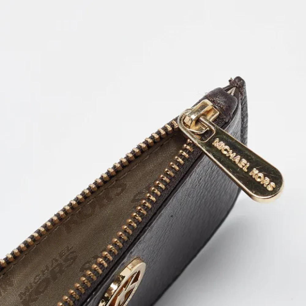 Michael Kors Pre-owned Leather wallets Brown Dames