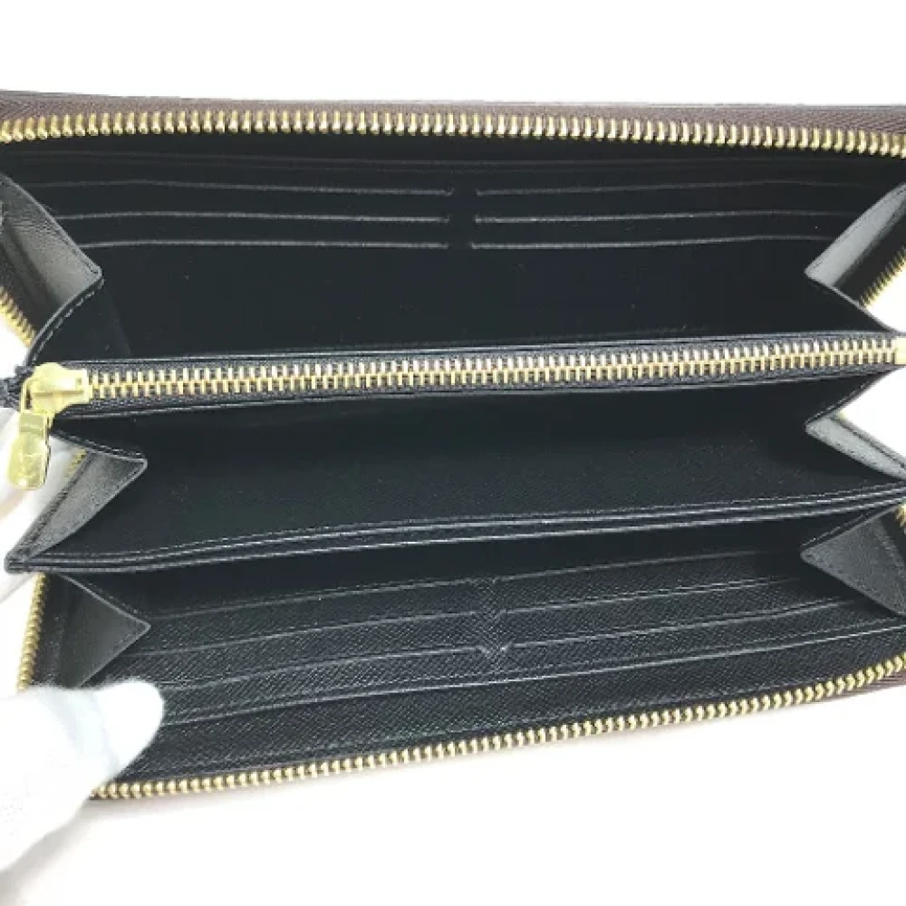 Louis Vuitton Vintage Pre-owned Leather wallets Brown Dames