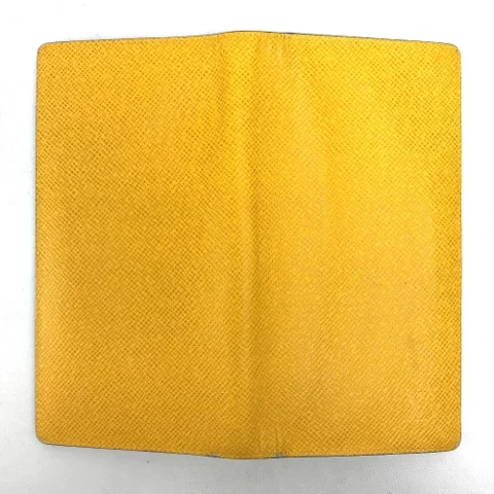 Louis Vuitton Vintage Pre-owned Leather wallets Yellow Heren