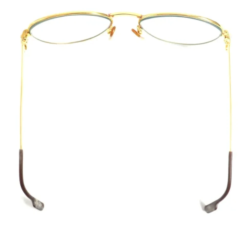 Cartier Vintage Pre-owned Metal sunglasses Yellow Dames