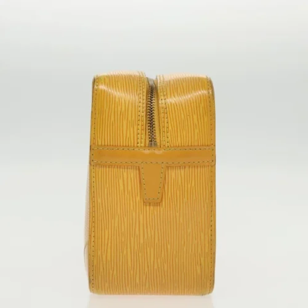 Louis Vuitton Vintage Pre-owned Leather clutches Yellow Dames