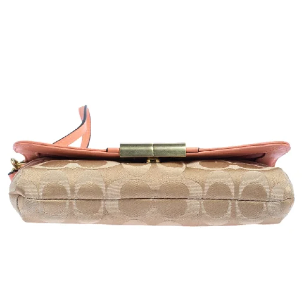 Coach Pre-owned Canvas clutches Beige Dames