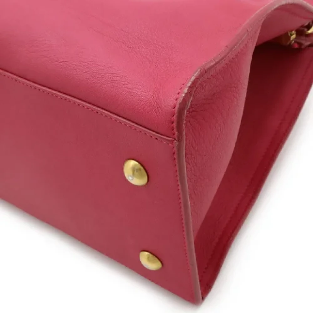 Yves Saint Laurent Vintage Pre-owned Leather handbags Red Dames