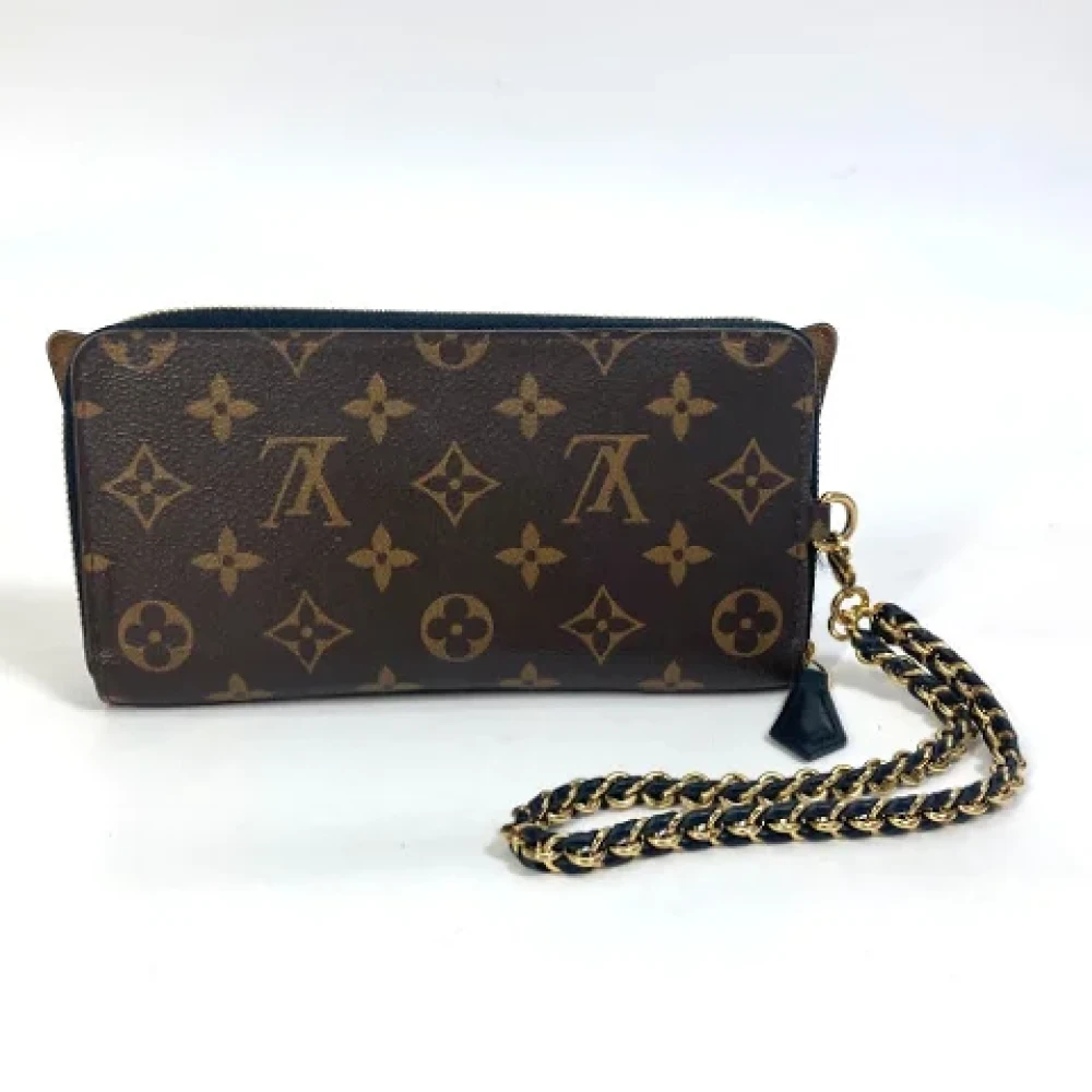 Louis Vuitton Vintage Pre-owned Fabric wallets Brown Dames