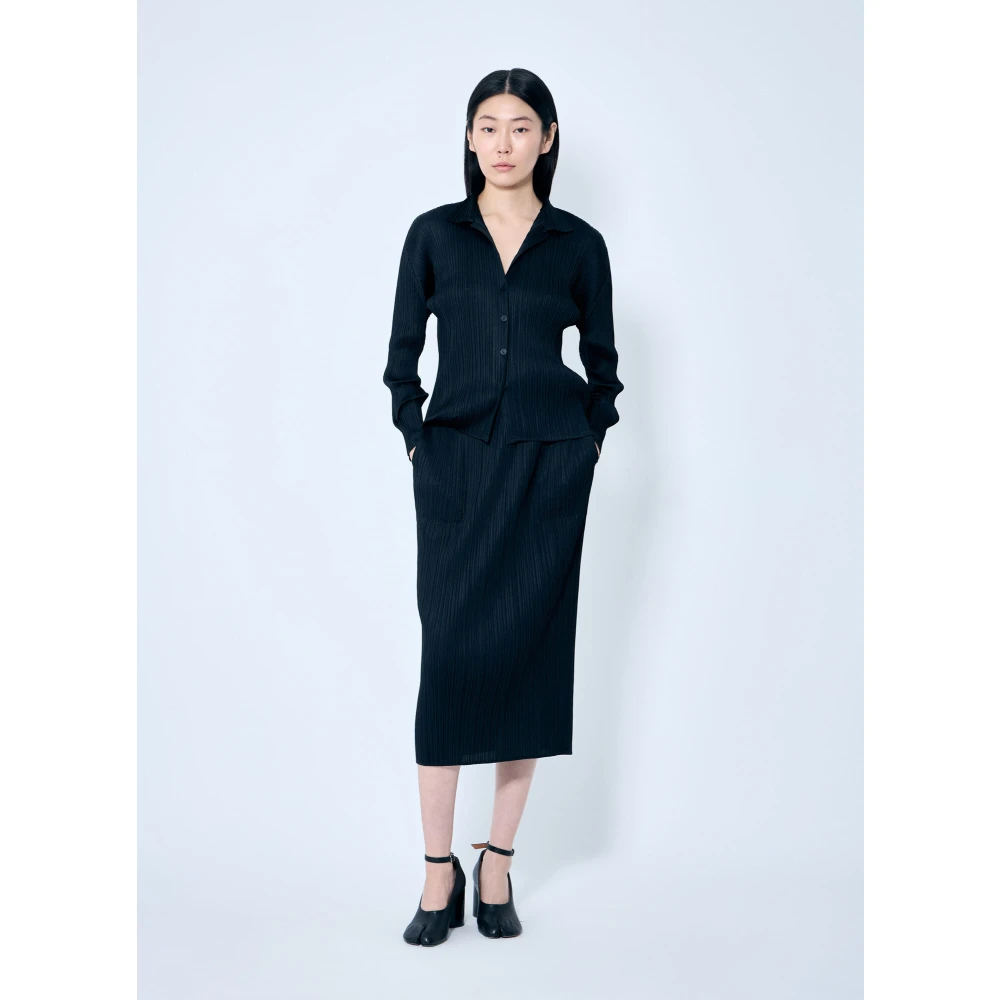 Issey Miyake Geplooide Midi Rok met Zakken Black Dames