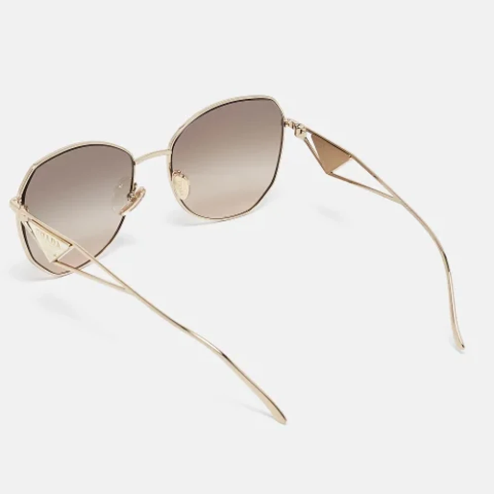 Prada Vintage Pre-owned Metal sunglasses Yellow Dames