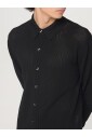 gilet-noir-tricote