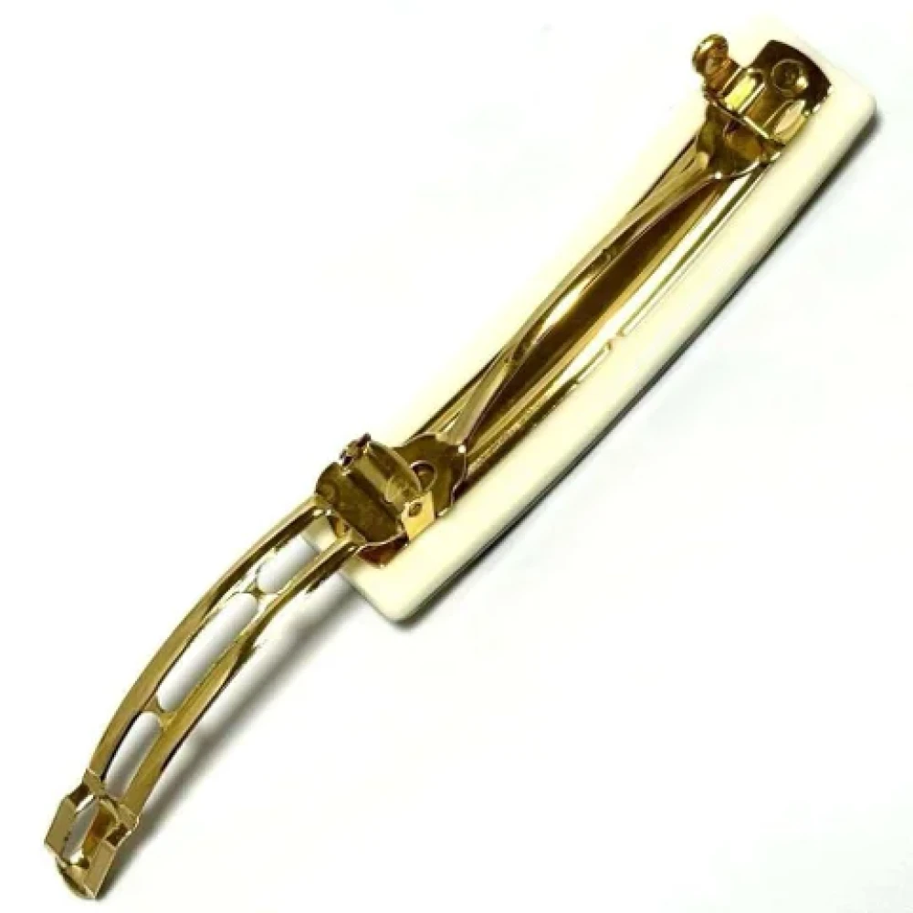 Louis Vuitton Vintage Pre-owned Plastic hair-accessories Beige Dames