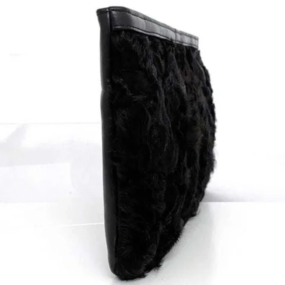 Loewe Pre-owned Leather clutches Black Dames