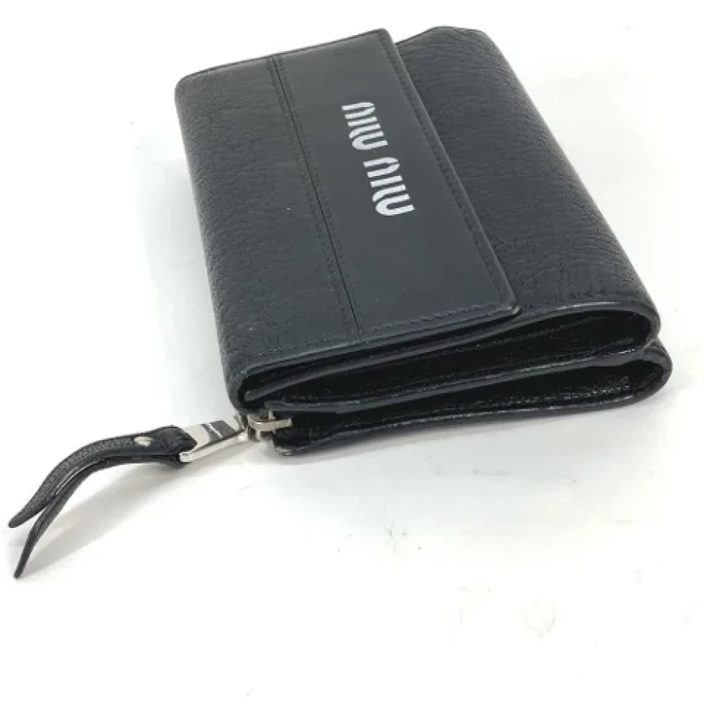 Miu Pre-owned Leather wallets Black Dames
