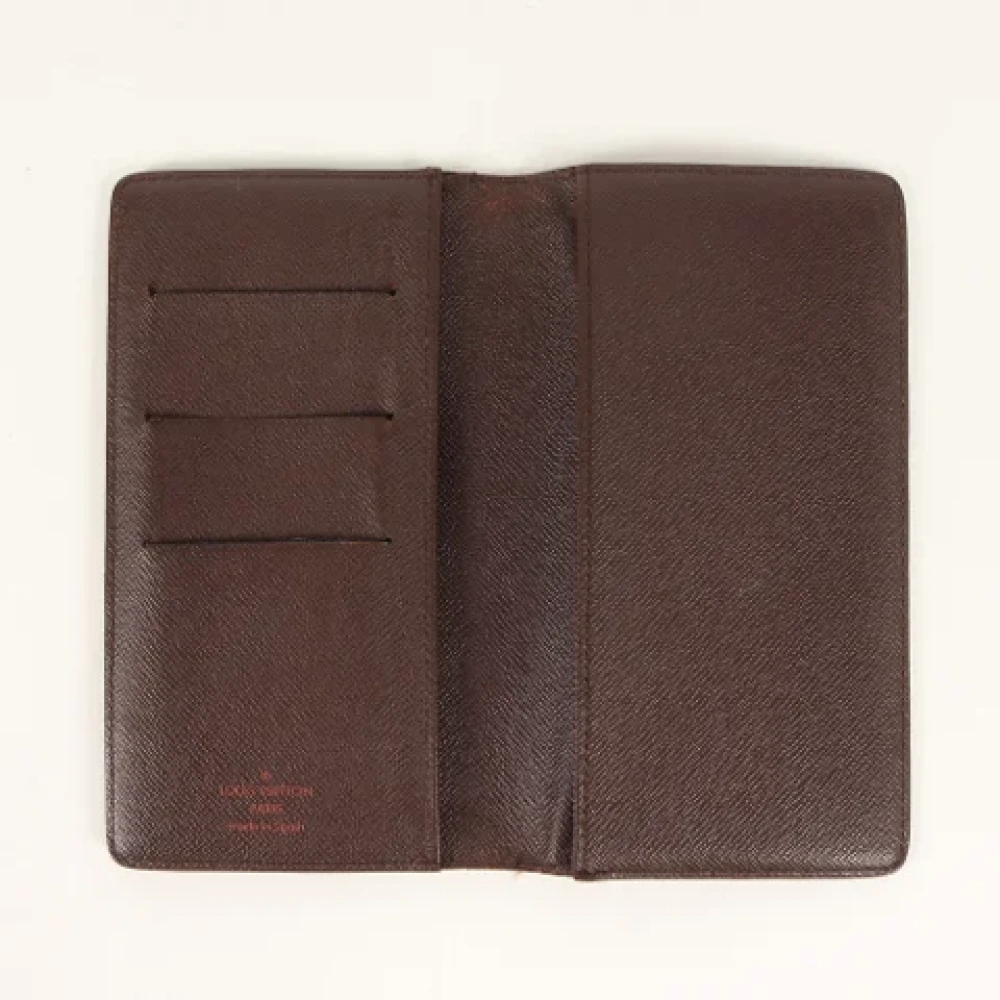 Louis Vuitton Vintage Pre-owned Leather wallets Brown Heren