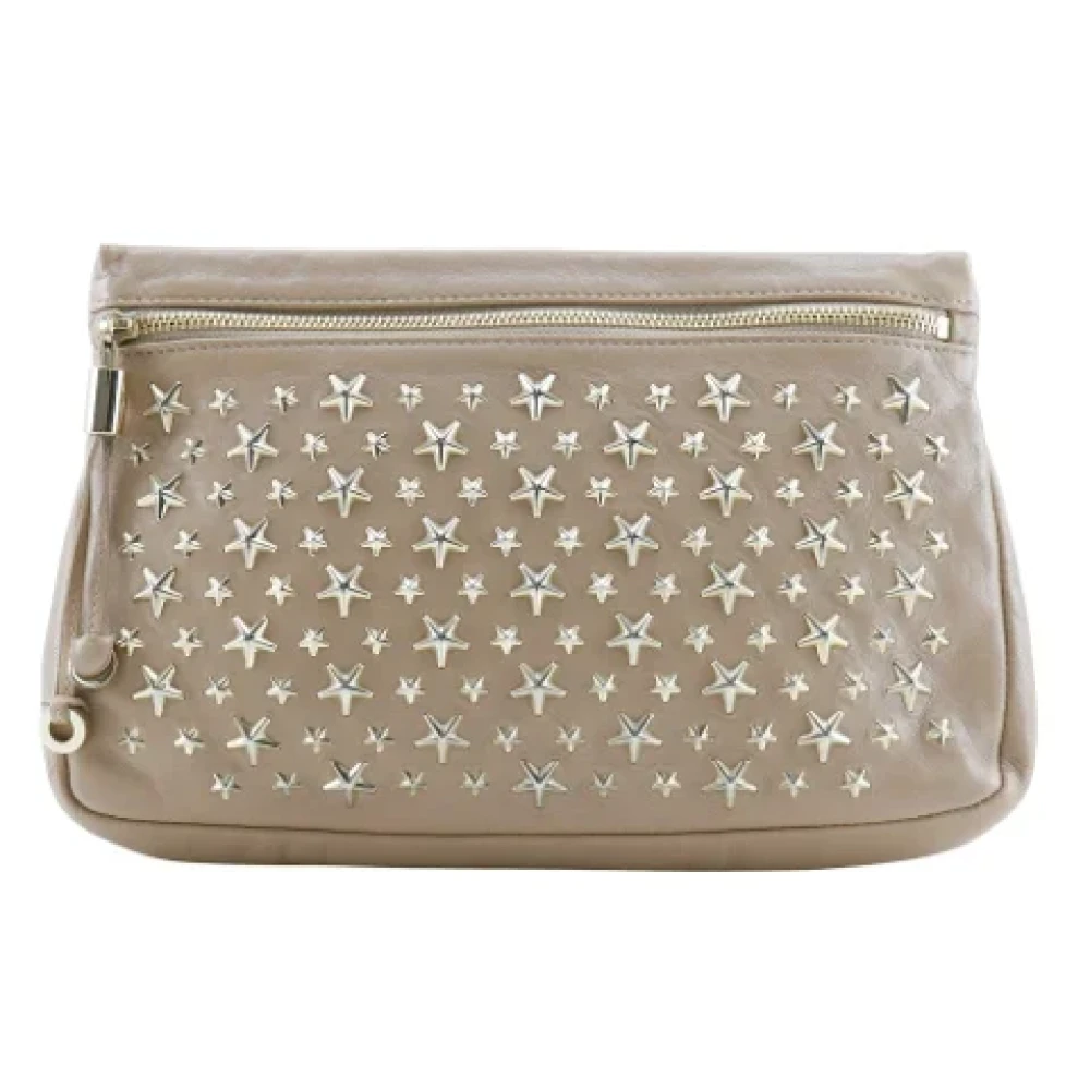 Jimmy Choo Pre-owned Leather pouches Beige Dames