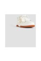 white-leather-sneakers-with-orange-sole