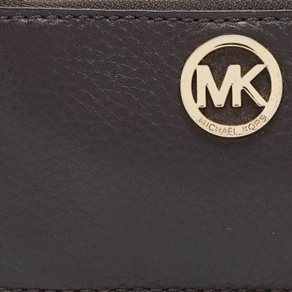 Michael Kors Pre-owned Leather wallets Brown Dames