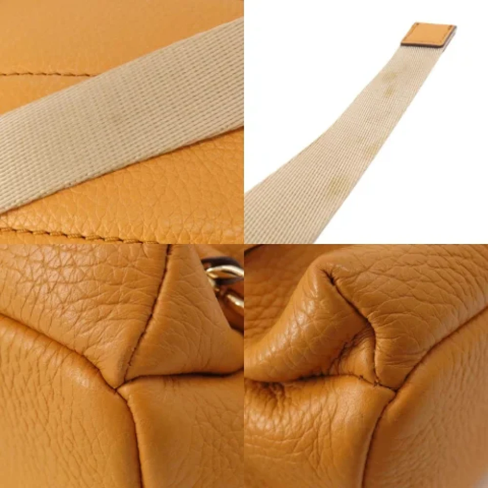 Michael Kors Pre-owned Fabric backpacks Yellow Dames