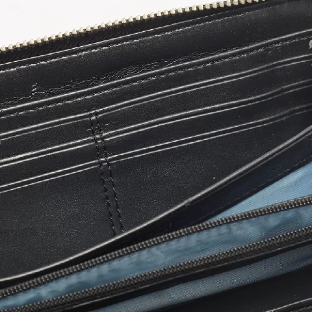 Coach Pre-owned Leather wallets Black Dames