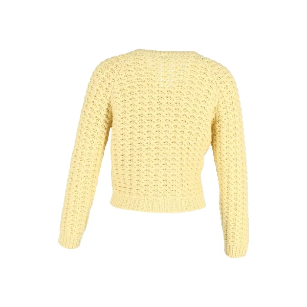 Miu Pre-owned Wool tops Yellow Dames