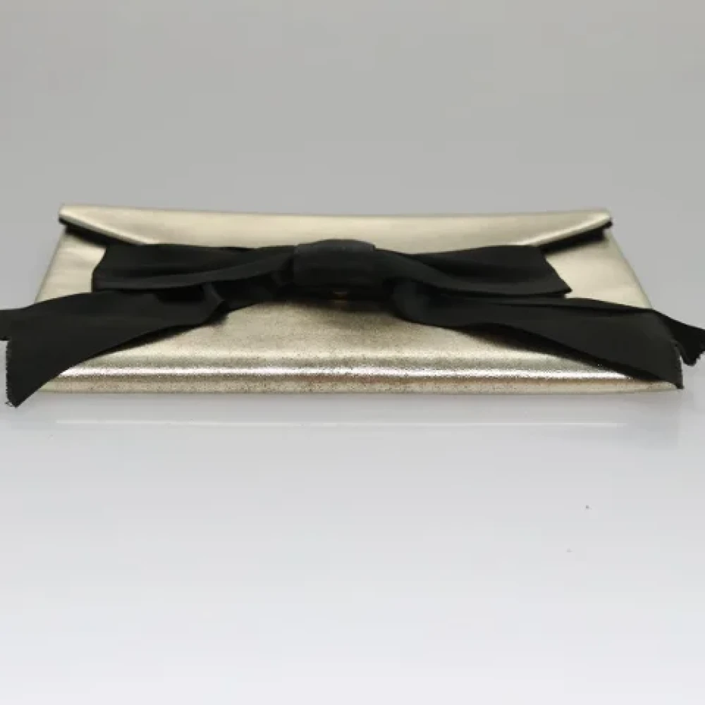 Saint Laurent Vintage Pre-owned Leather clutches Yellow Dames