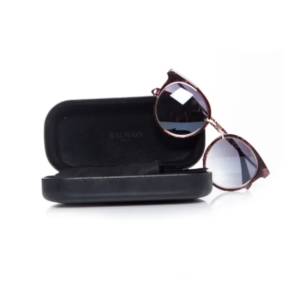Balmain Pre-owned Plastic sunglasses Red Dames