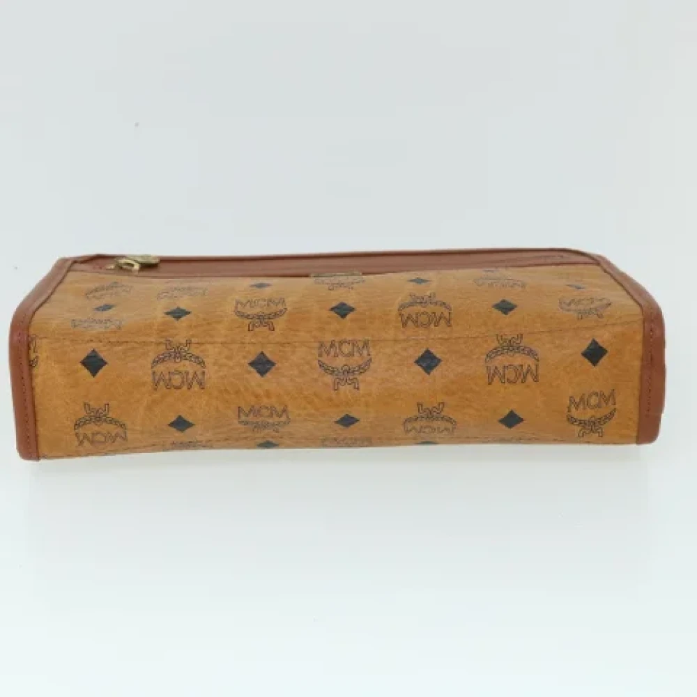 MCM Pre-owned Leather clutches Brown Dames