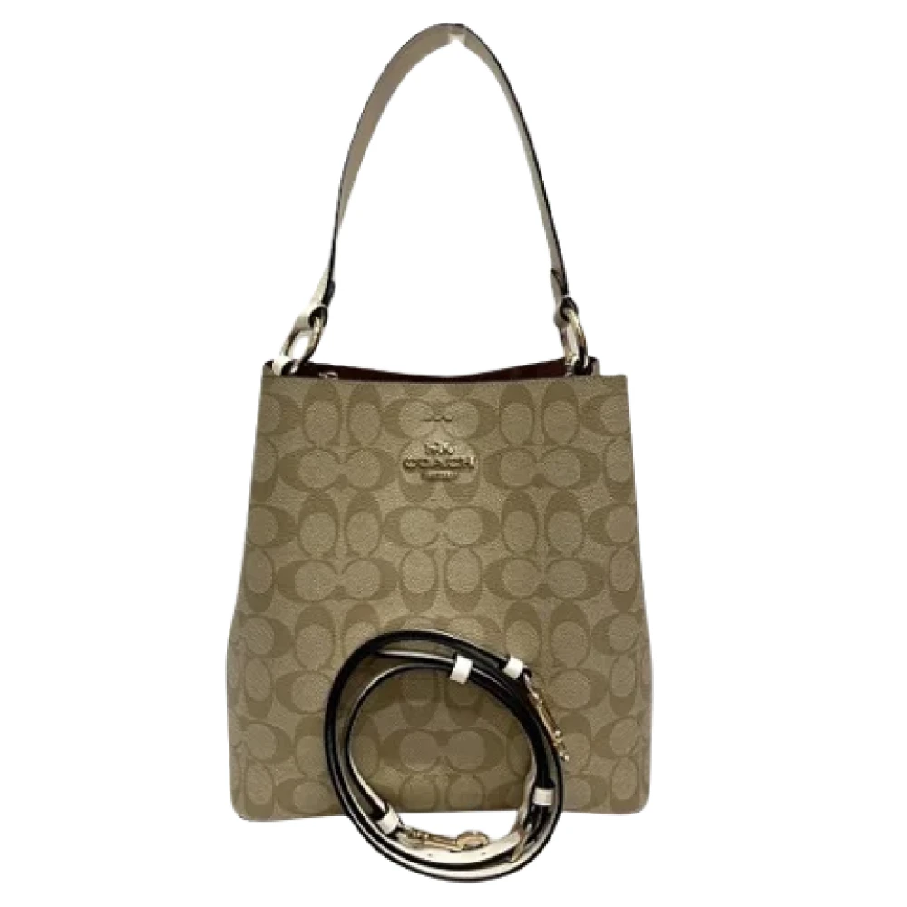 Coach Pre-owned Plastic handbags Beige Dames