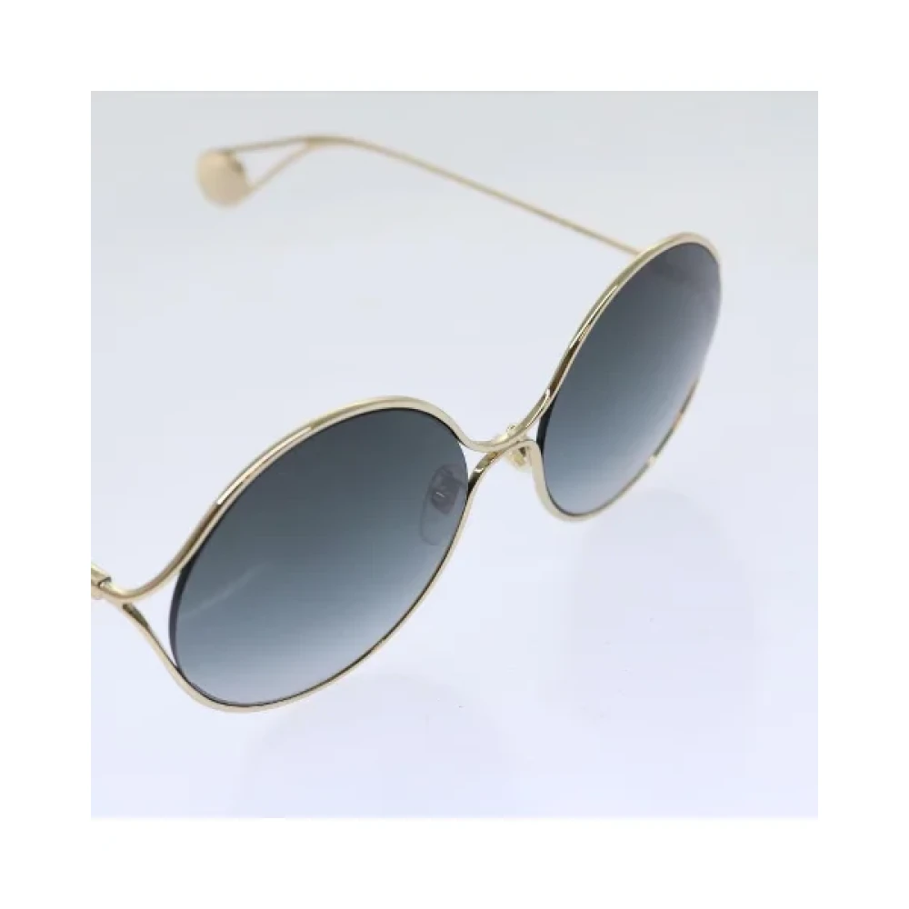 Gucci Vintage Pre-owned Metal sunglasses Yellow Dames