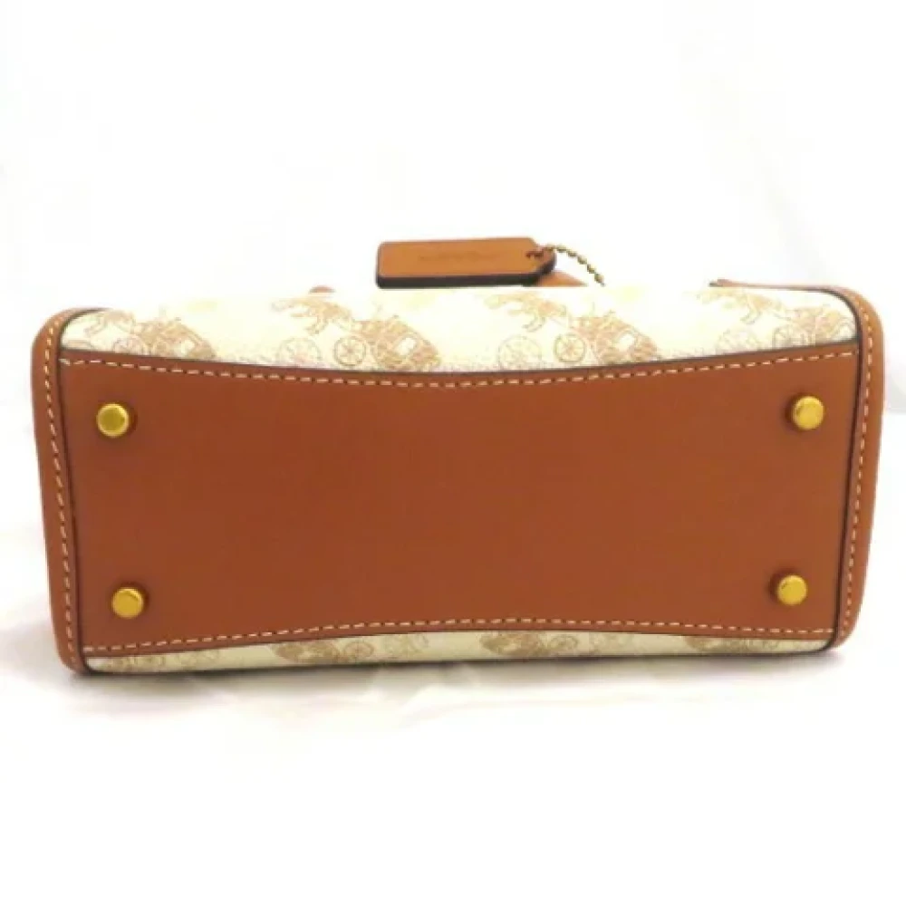 Coach Pre-owned Plastic handbags Beige Dames
