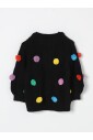 cardigan-en-tricot-pompon