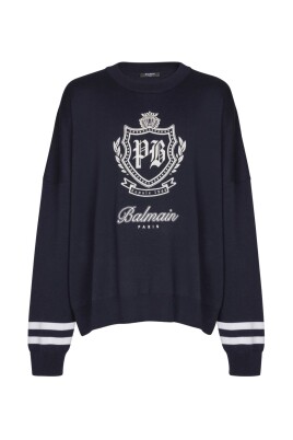 pull-en-laine-bleu-detail-embleme
