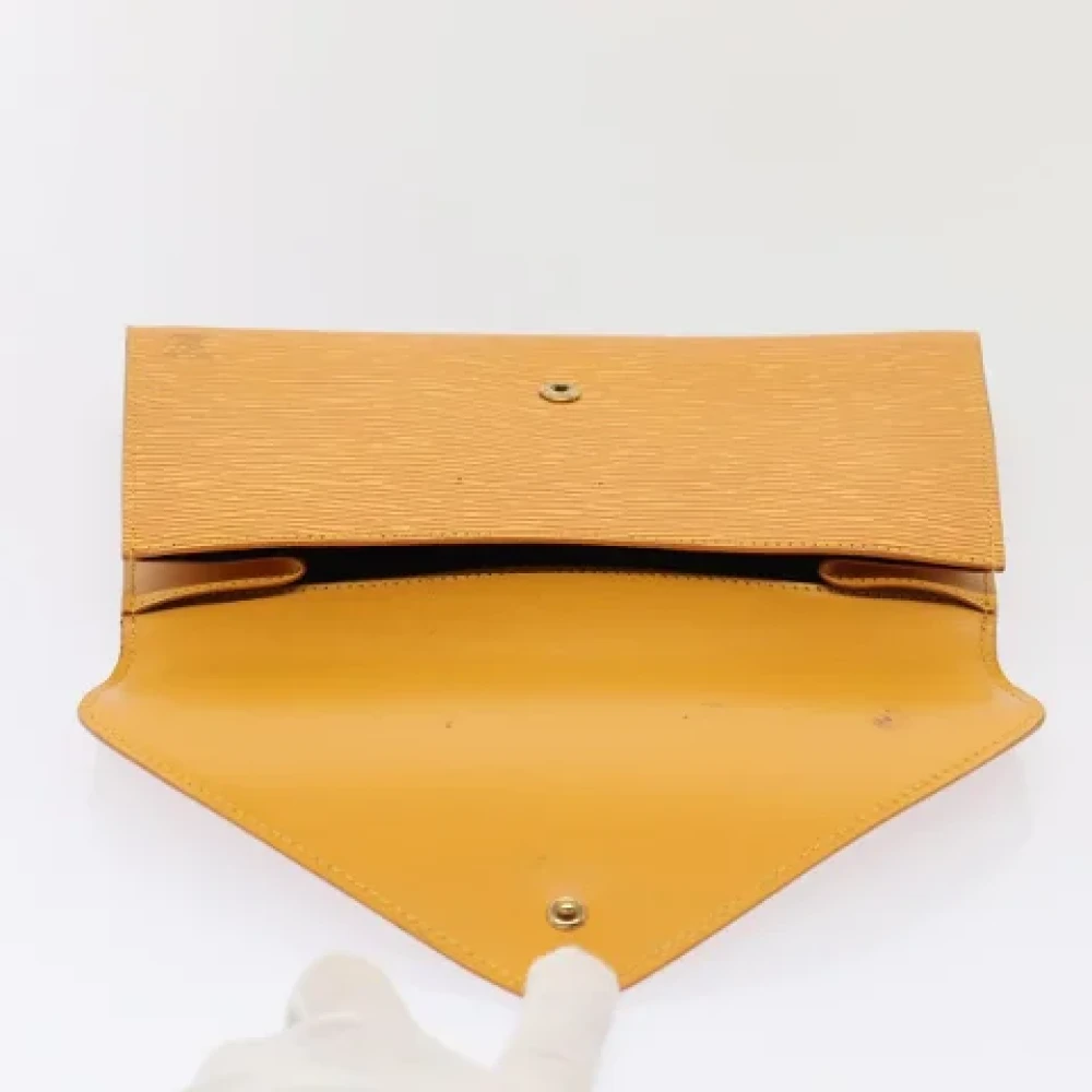 Louis Vuitton Vintage Pre-owned Leather clutches Yellow Dames