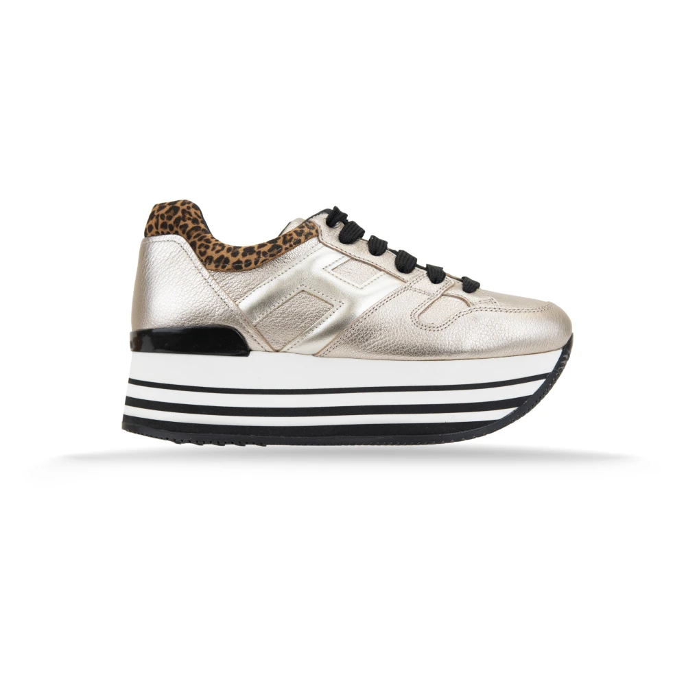 Hogan Gelamineerde leren vetersneakers Dames Schoenen Geel