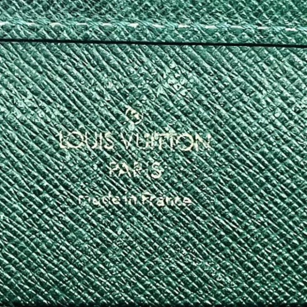 Louis Vuitton Vintage Pre-owned Leather clutches Green Heren